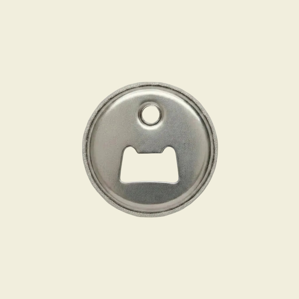 Metallic fridge magnet and bottle opener 