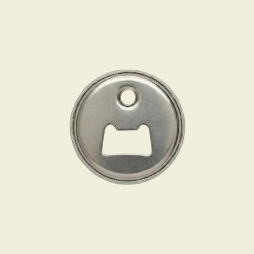 Metallic fridge magnet and bottle opener 